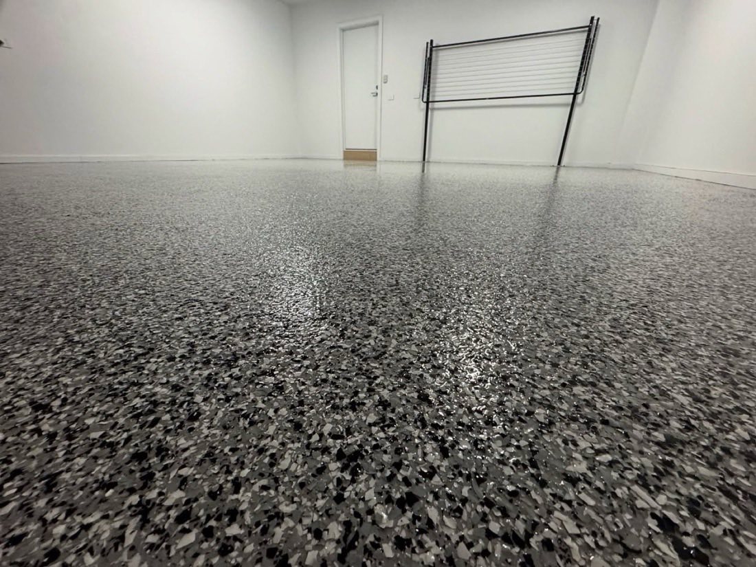 Black and grey flake epoxy garage floor finish